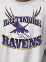 Maleficent’s Raven Baltimore Ravens Disney x Champion 2026 Unisex Heather Gray Reverse Weave Sweatshirt